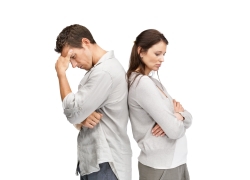 Couple with backs against each other upset